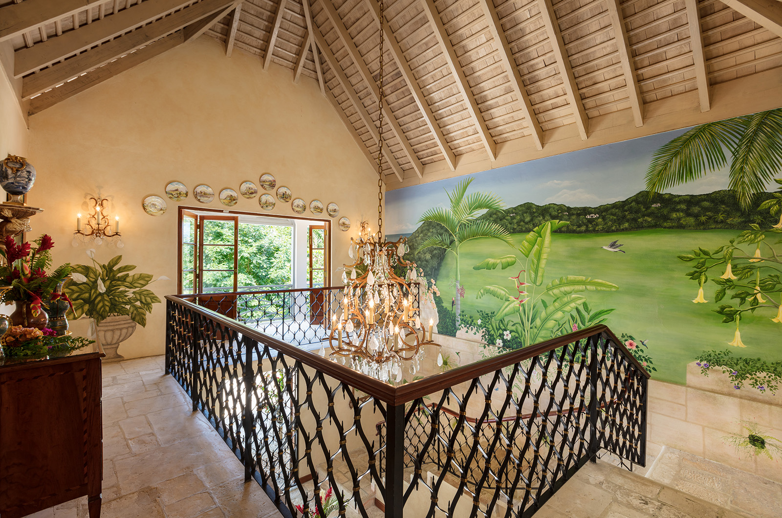 Little Hill villa interior plants and bannisters