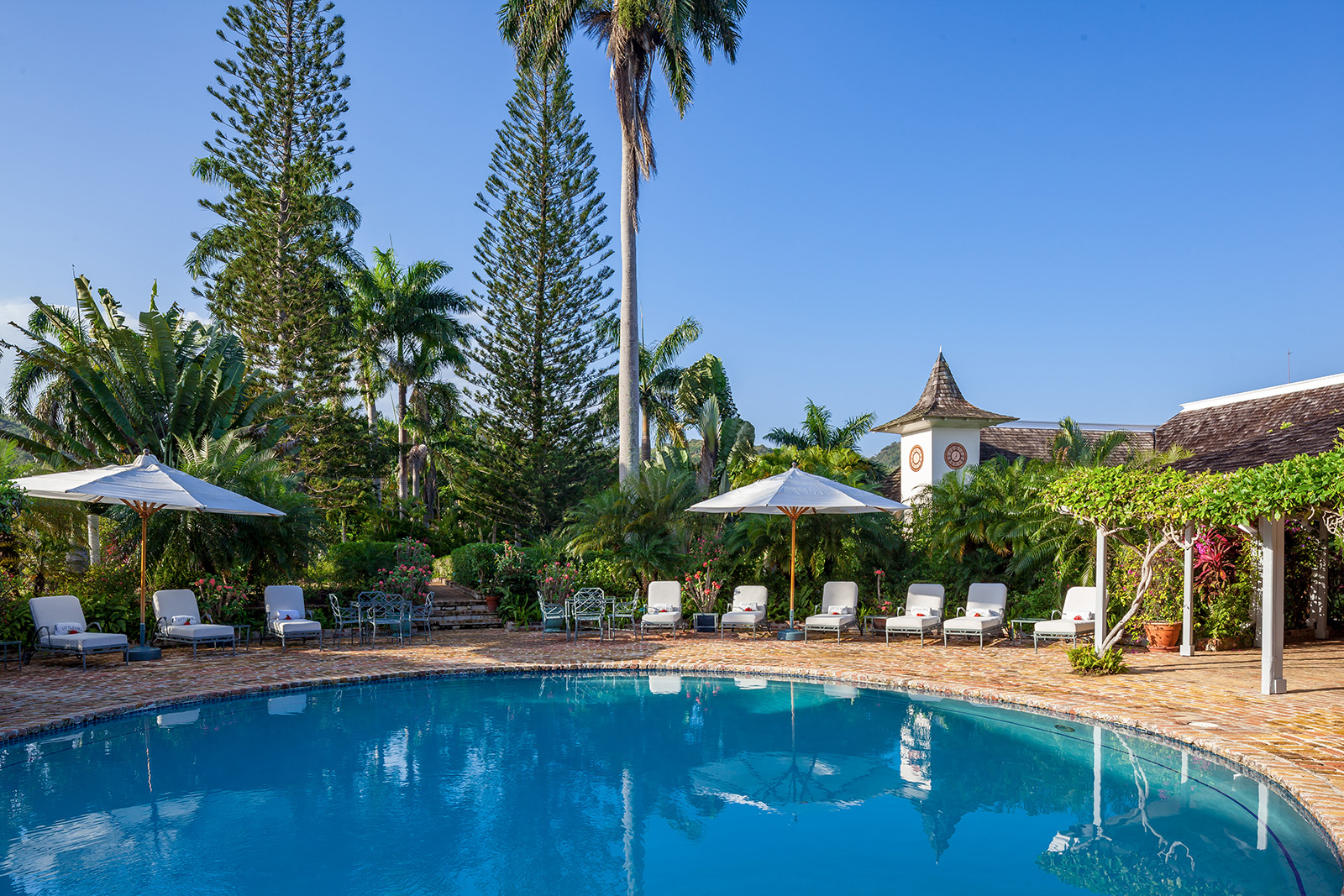 Little Hill villa pool area with sun loungers