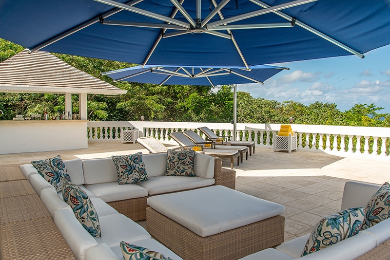 Villa Amana shaded outdoor seating area