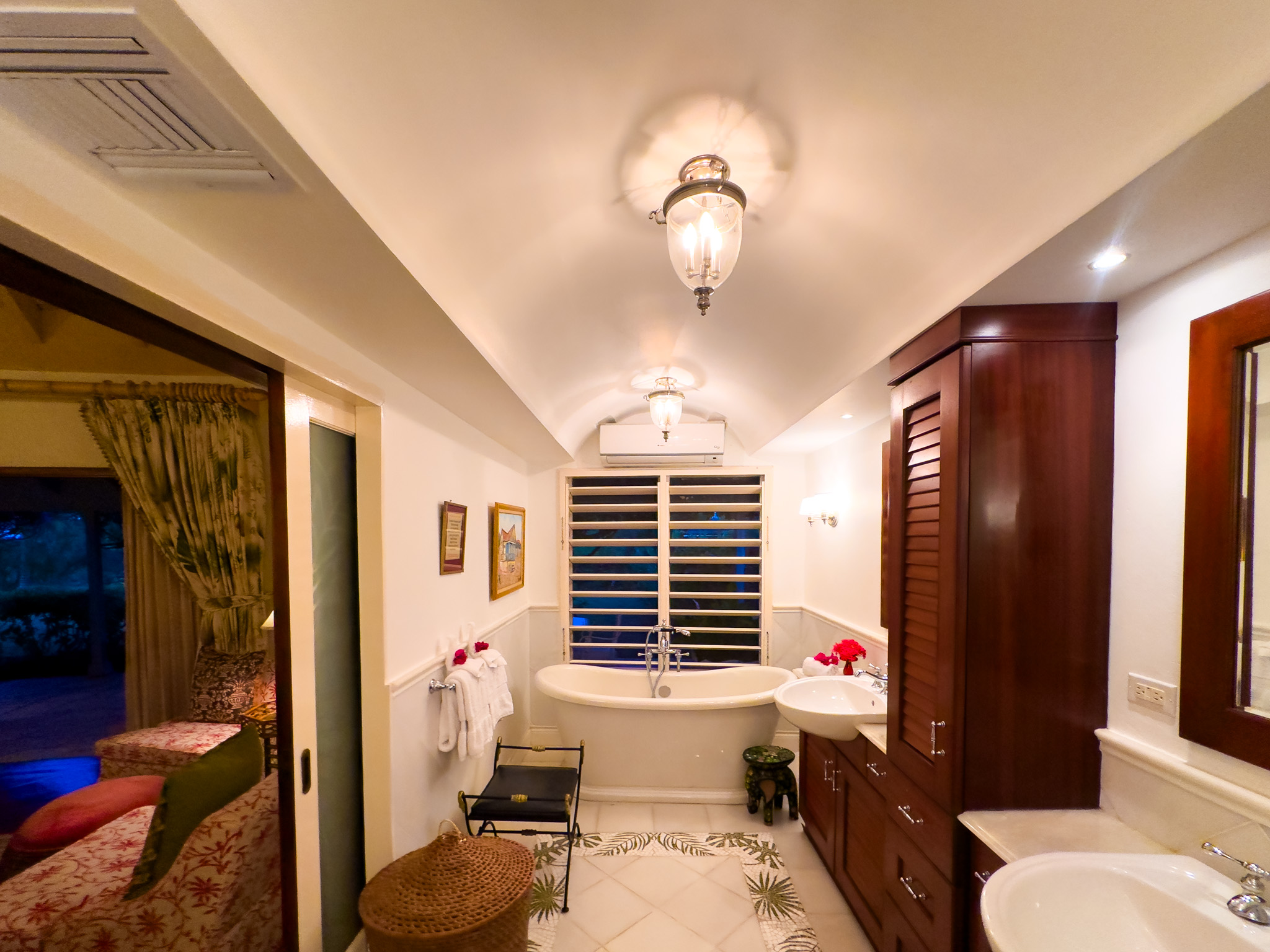 Little Hill villa bathroom with bath and sinks