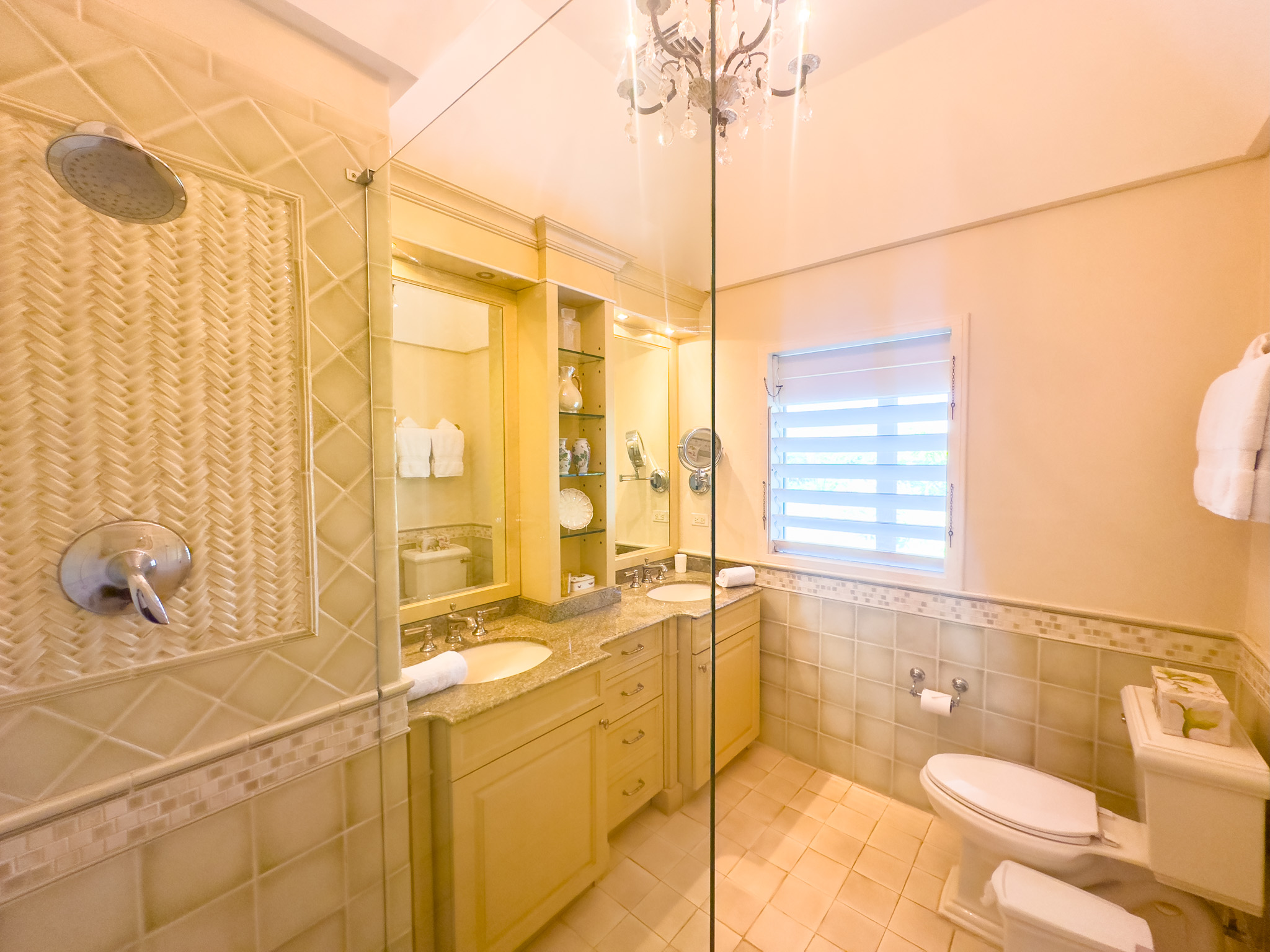 Little Hill villa bathroom with lights on