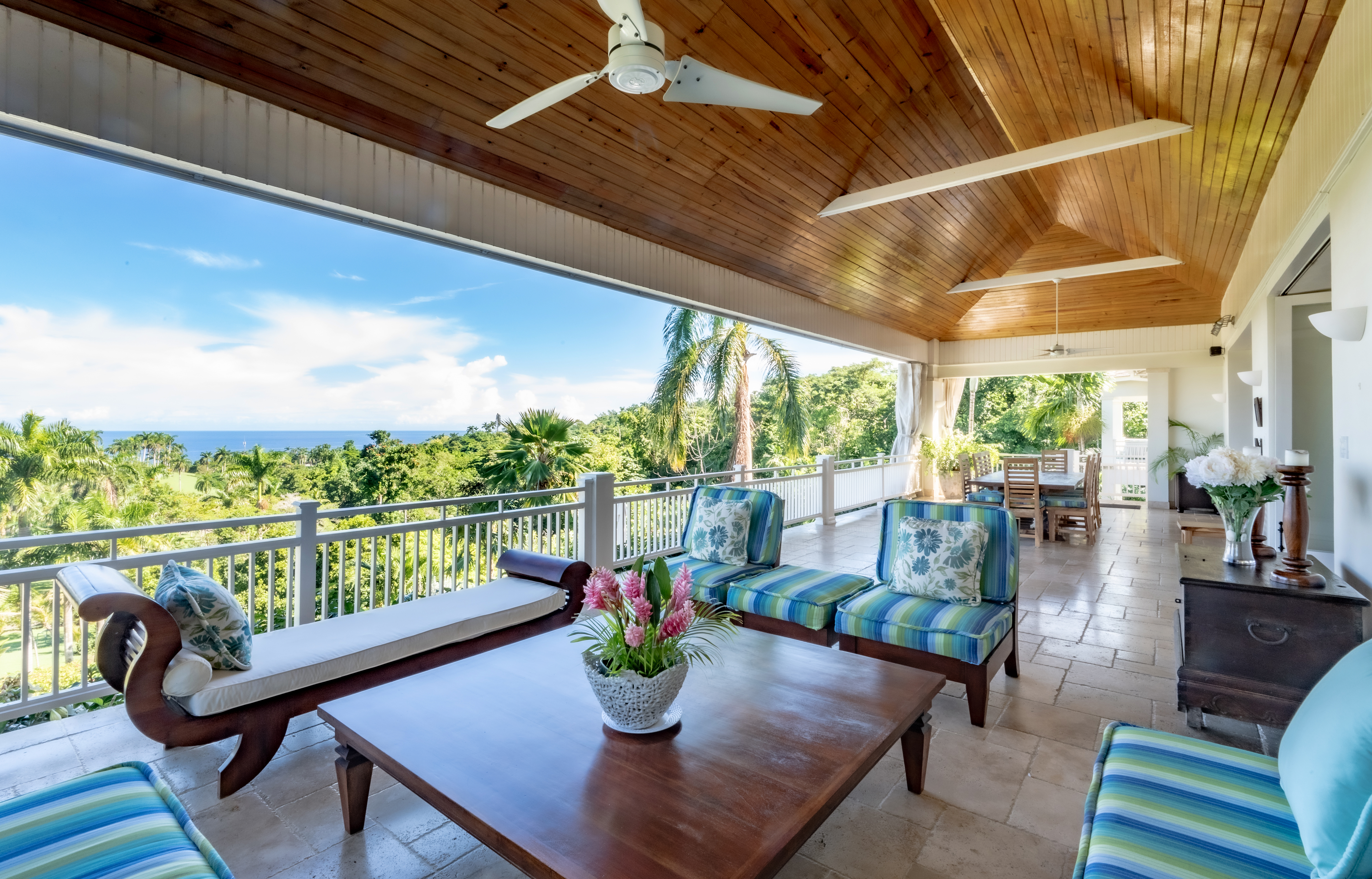 Hanover Windward Gardens table, sofa and view of the sea