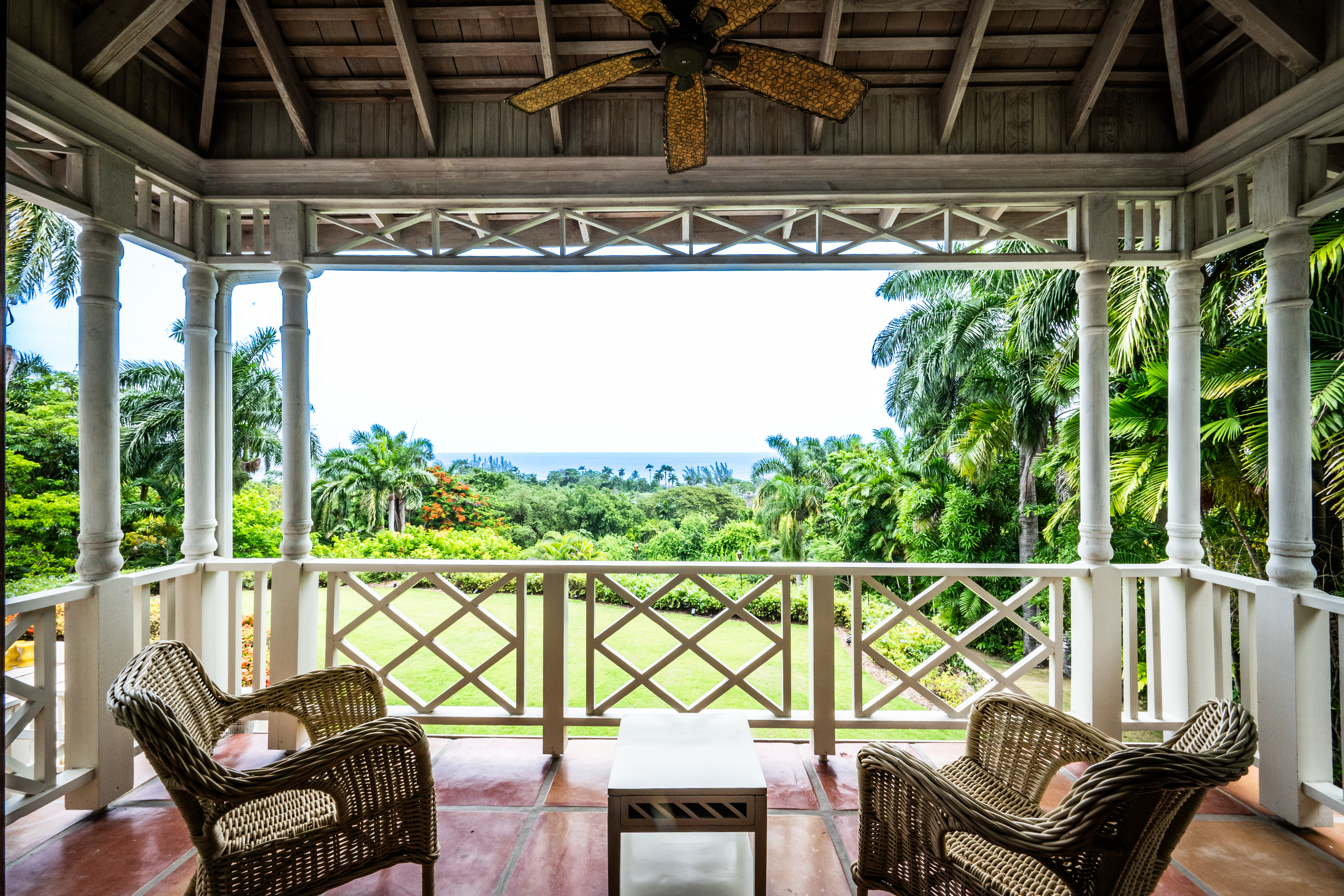 Pineapple House two chairs and a table with a view of the Caribbean Sea