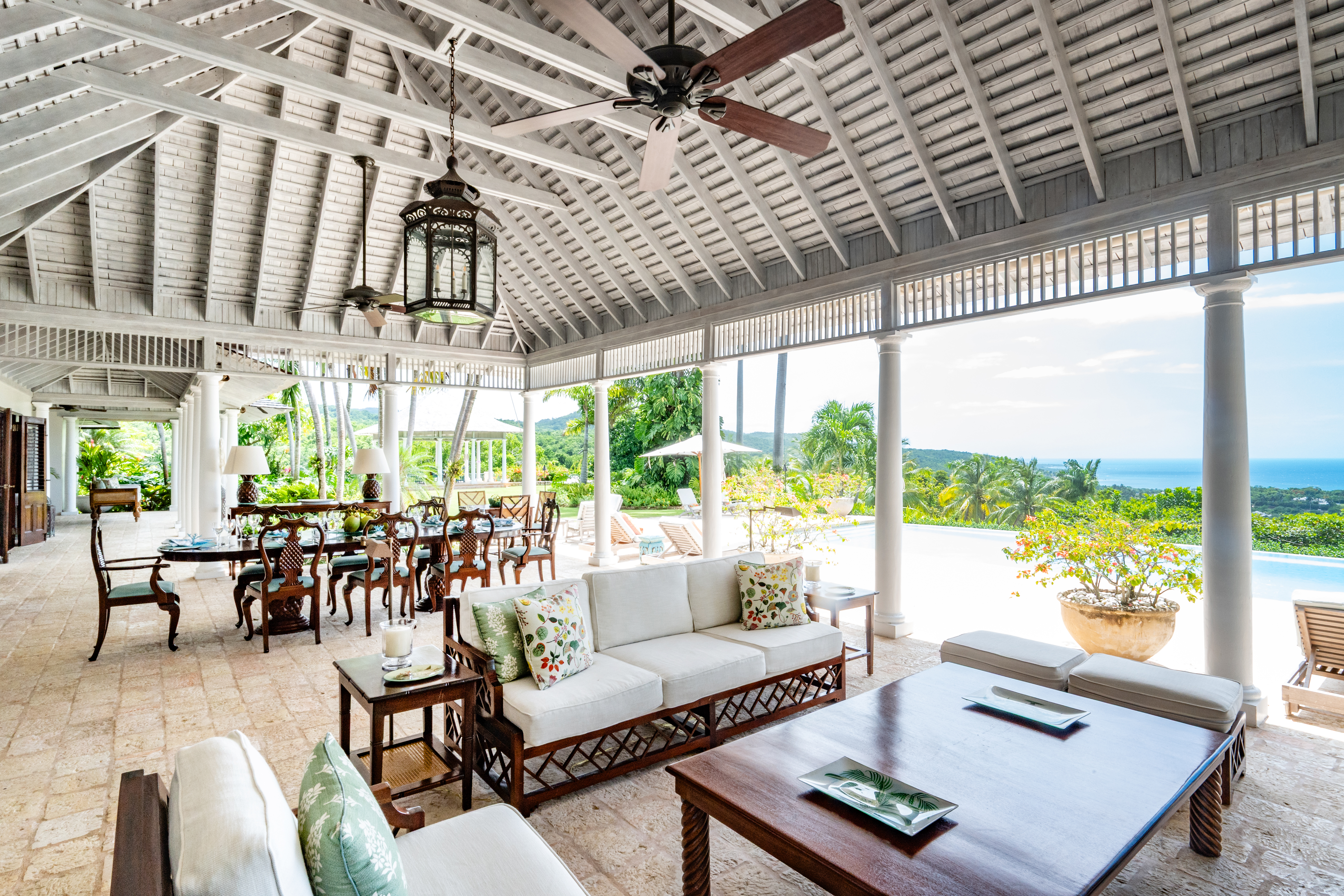 Point of View villa patio seating with sofa and view of the Caribbean Sea