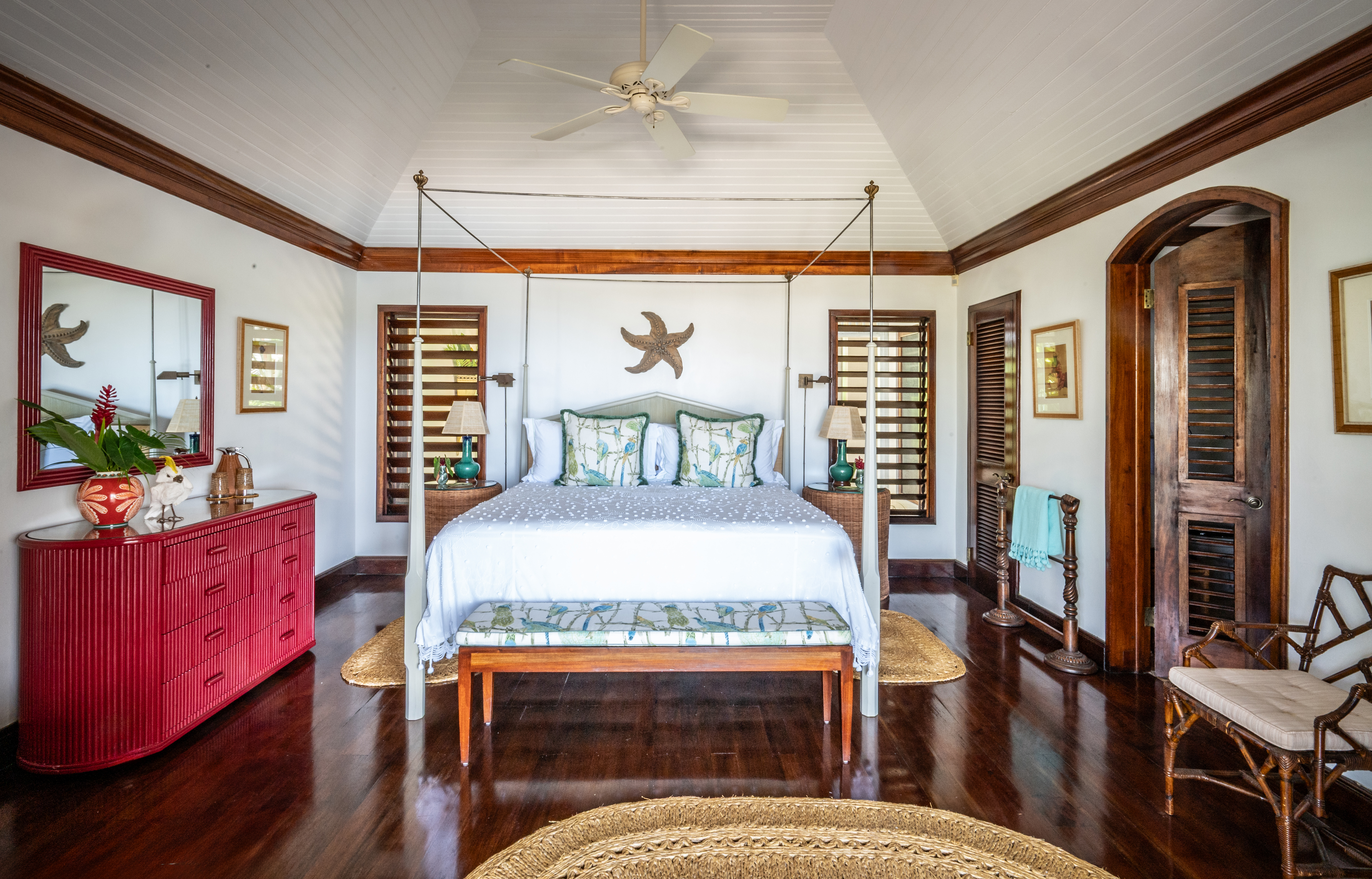 Point of View villa large bed and red chest of drawers
