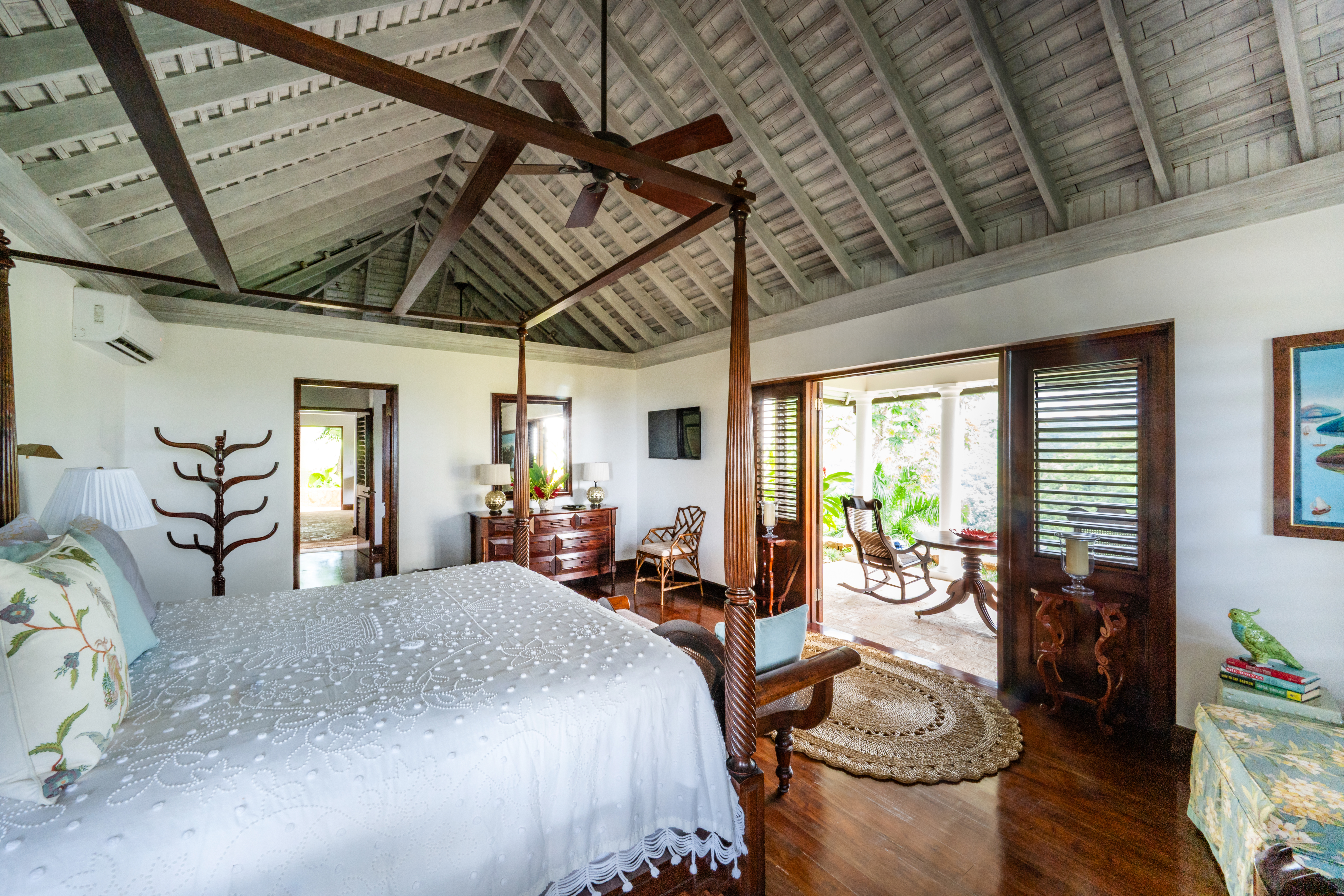 Point of View villa bedroom with a four-poster bed