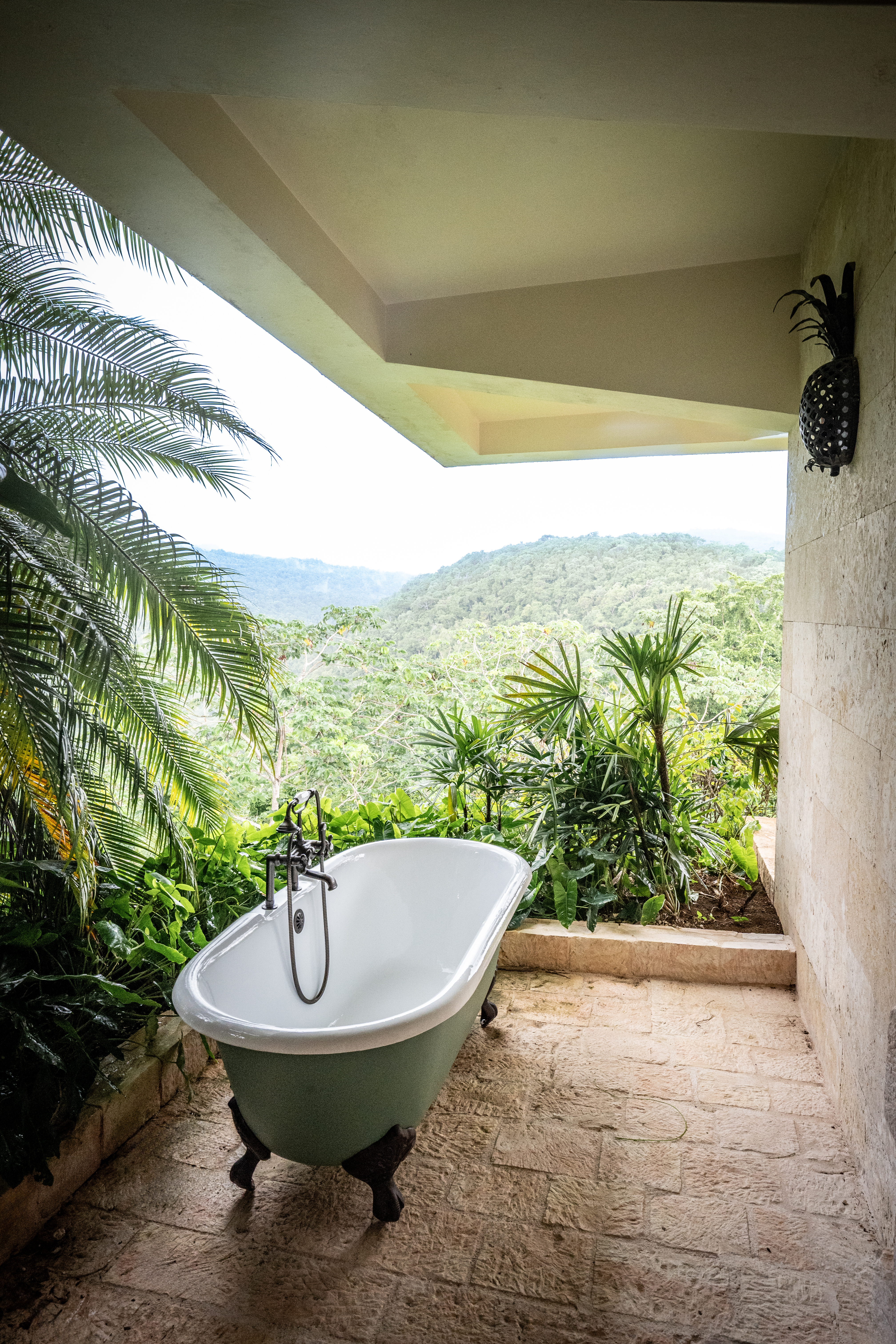 Point of View villa outdoor bath with a view of the jungle and hills