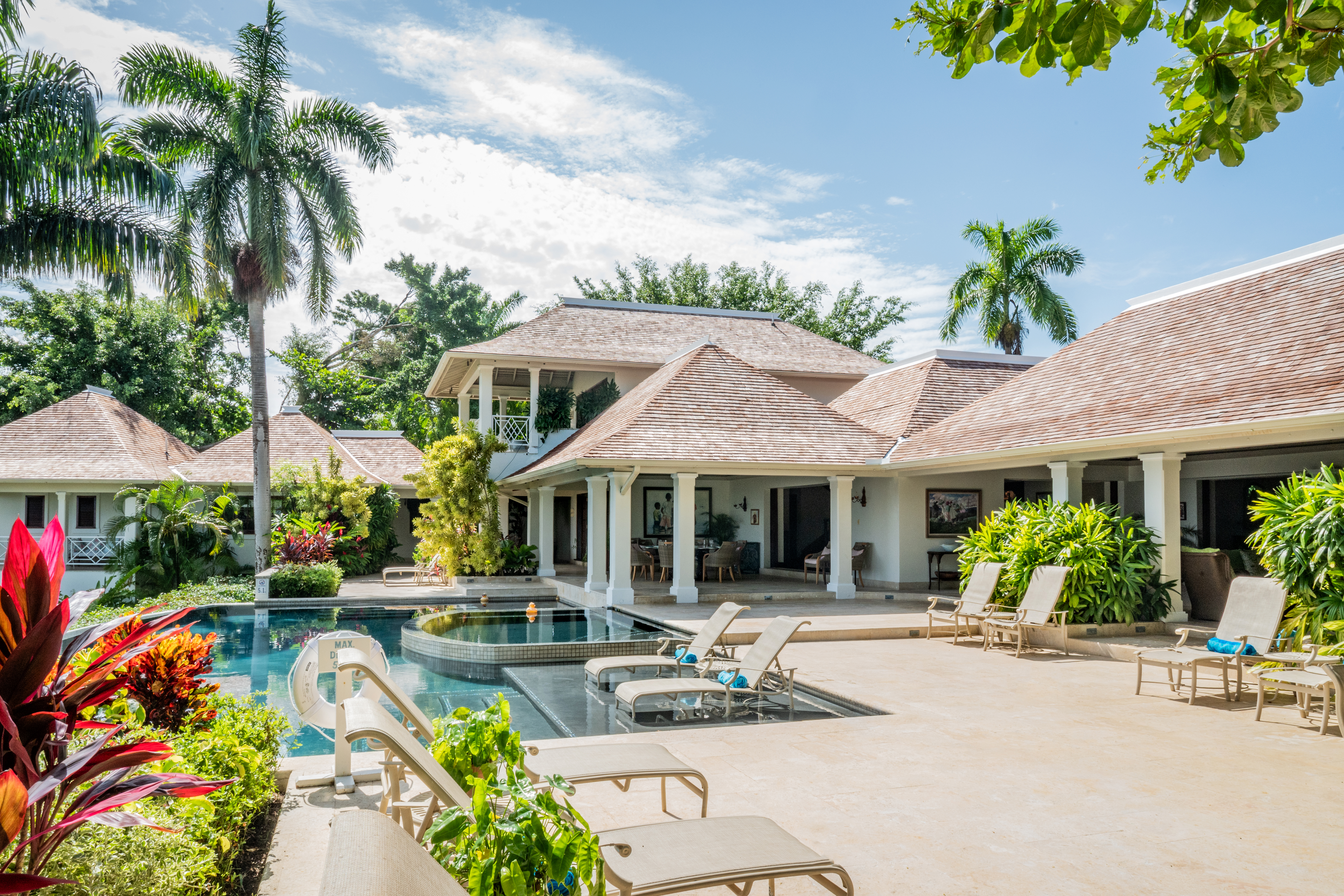 Someday Soon villa pool area and building