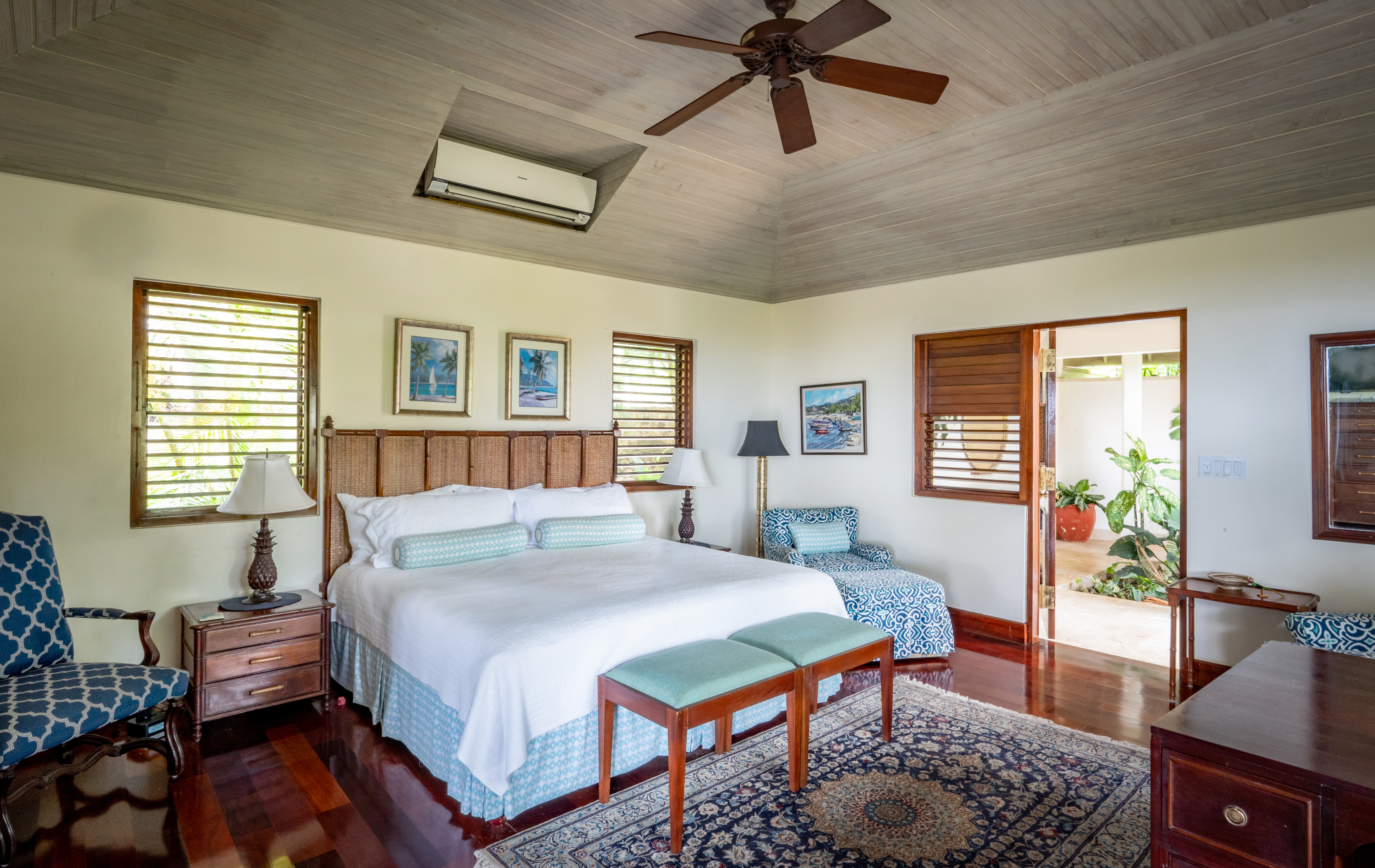 Someday Soon villa bedroom with a large bed