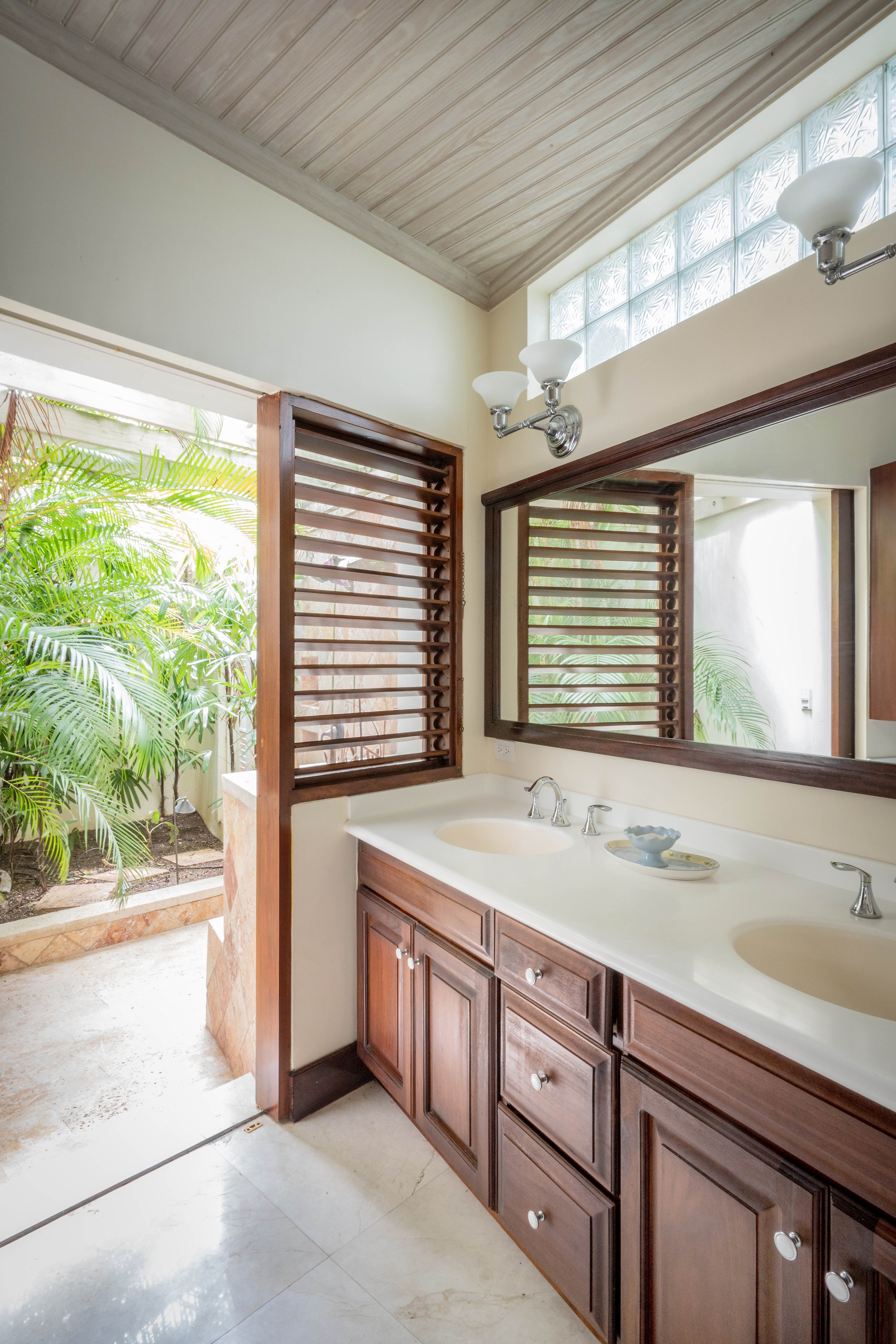 Someday Soon villa wash basins and open doors