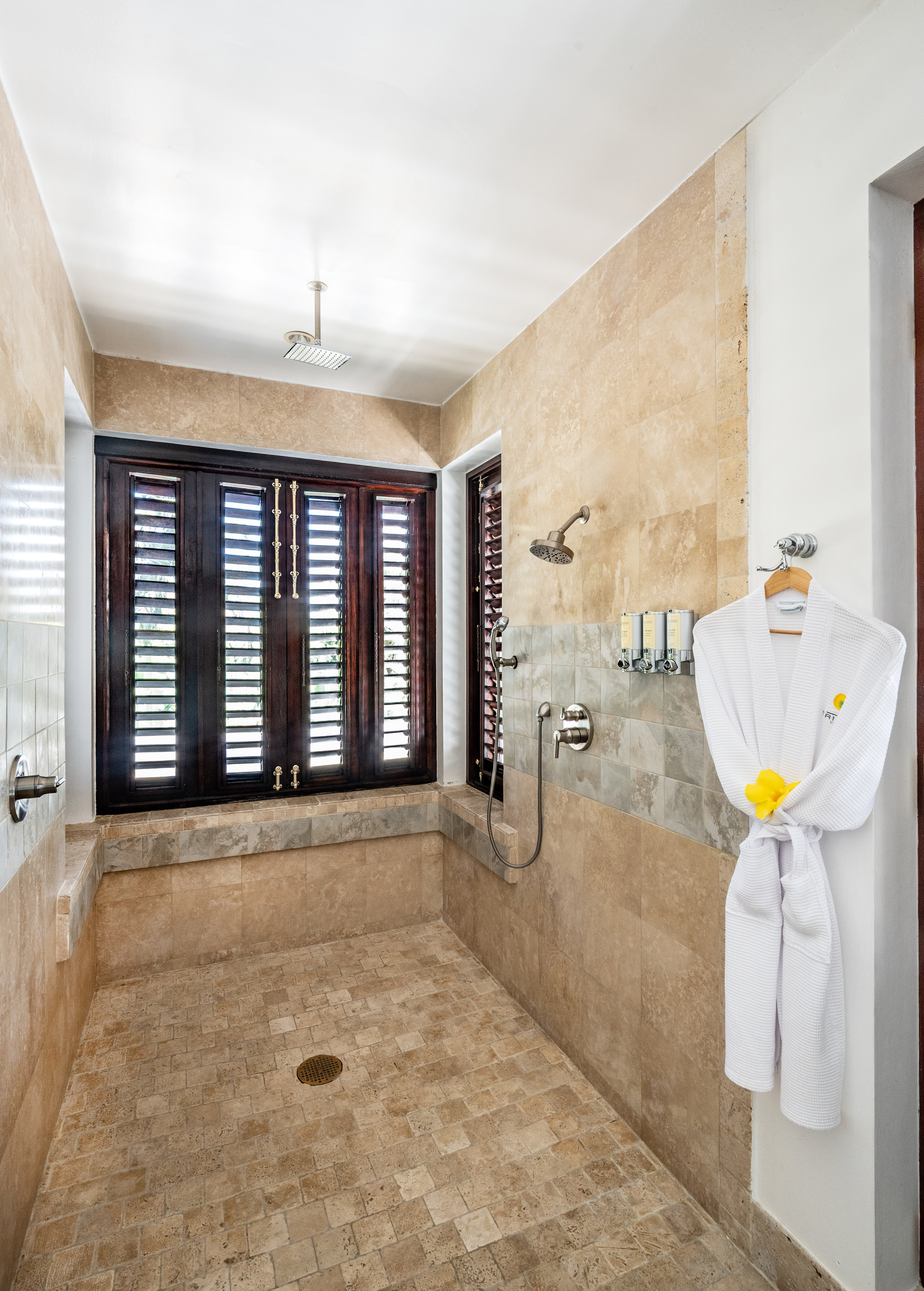 Trinity Villa bathroom with white dressing gown hanging