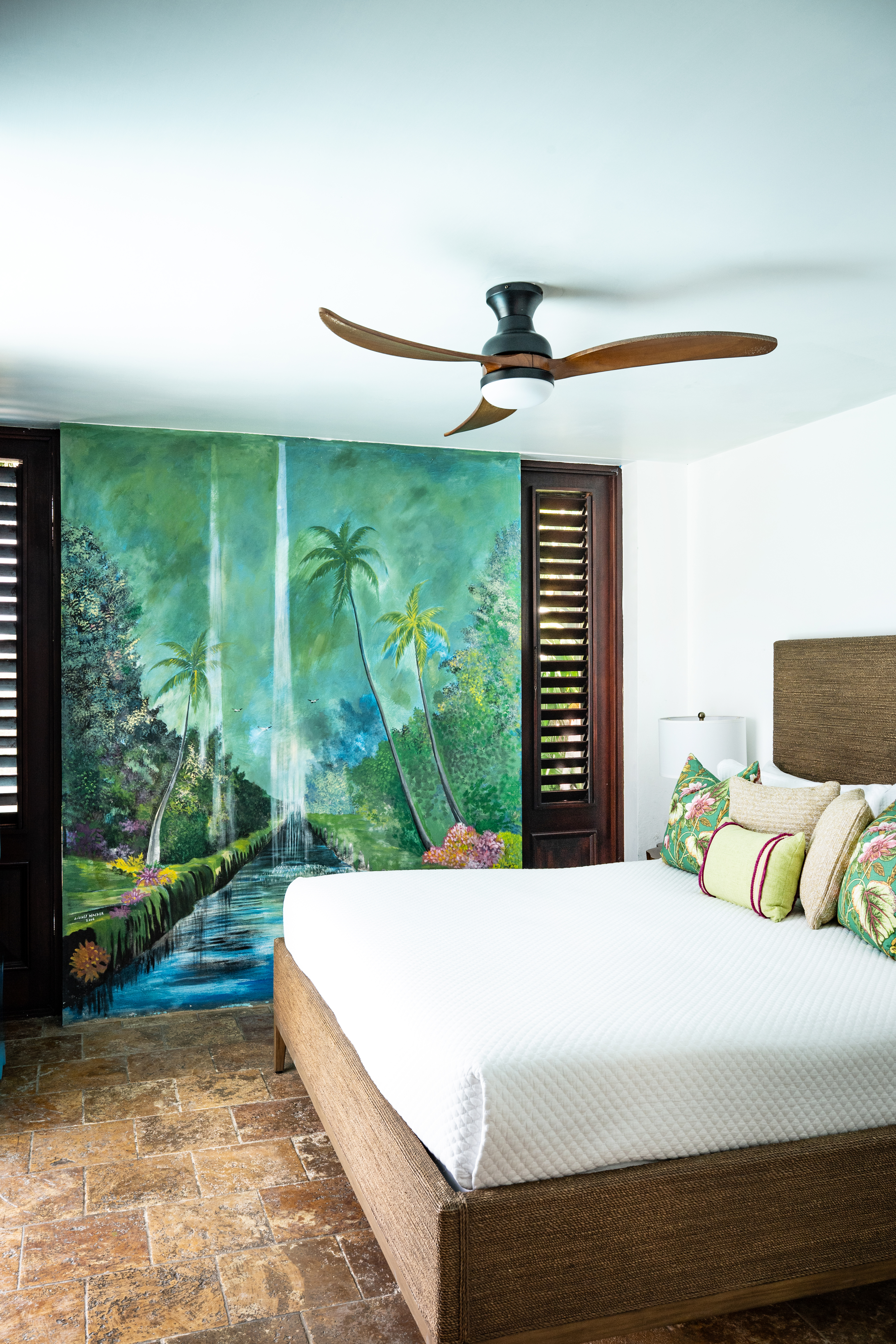 Trinity Villa bedroom with double bed and a painting
