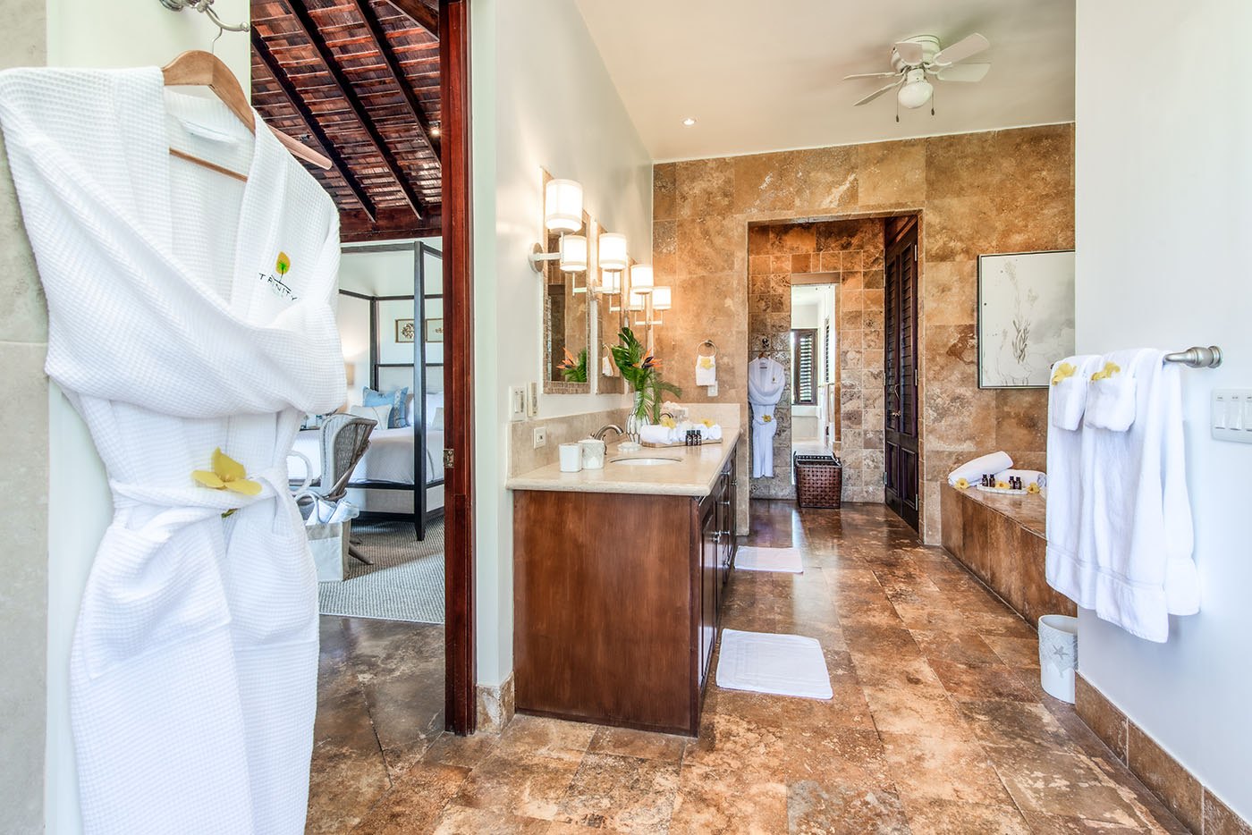 Trinity Villa bathroom with white dressing gowns and fresh towels
