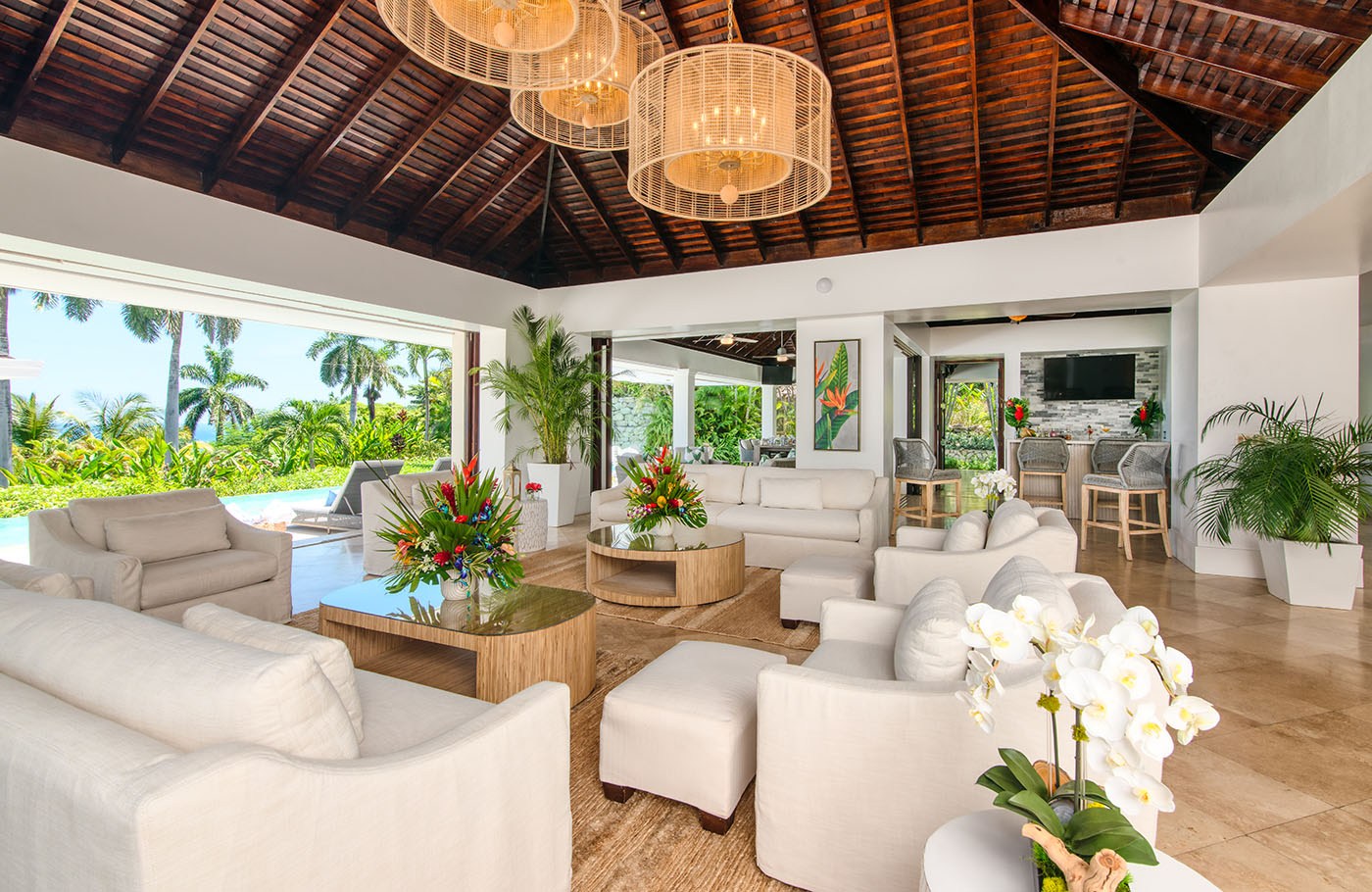 Trinity Villa seating area with cream sofas and coffee tables