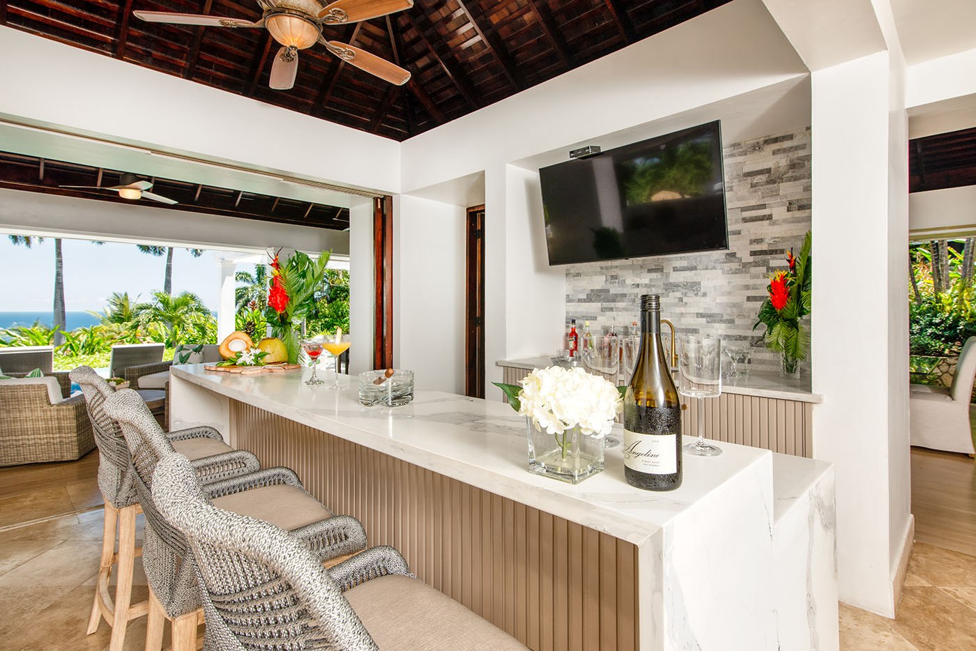 Trinity Villa bar area with a bottle on the counter
