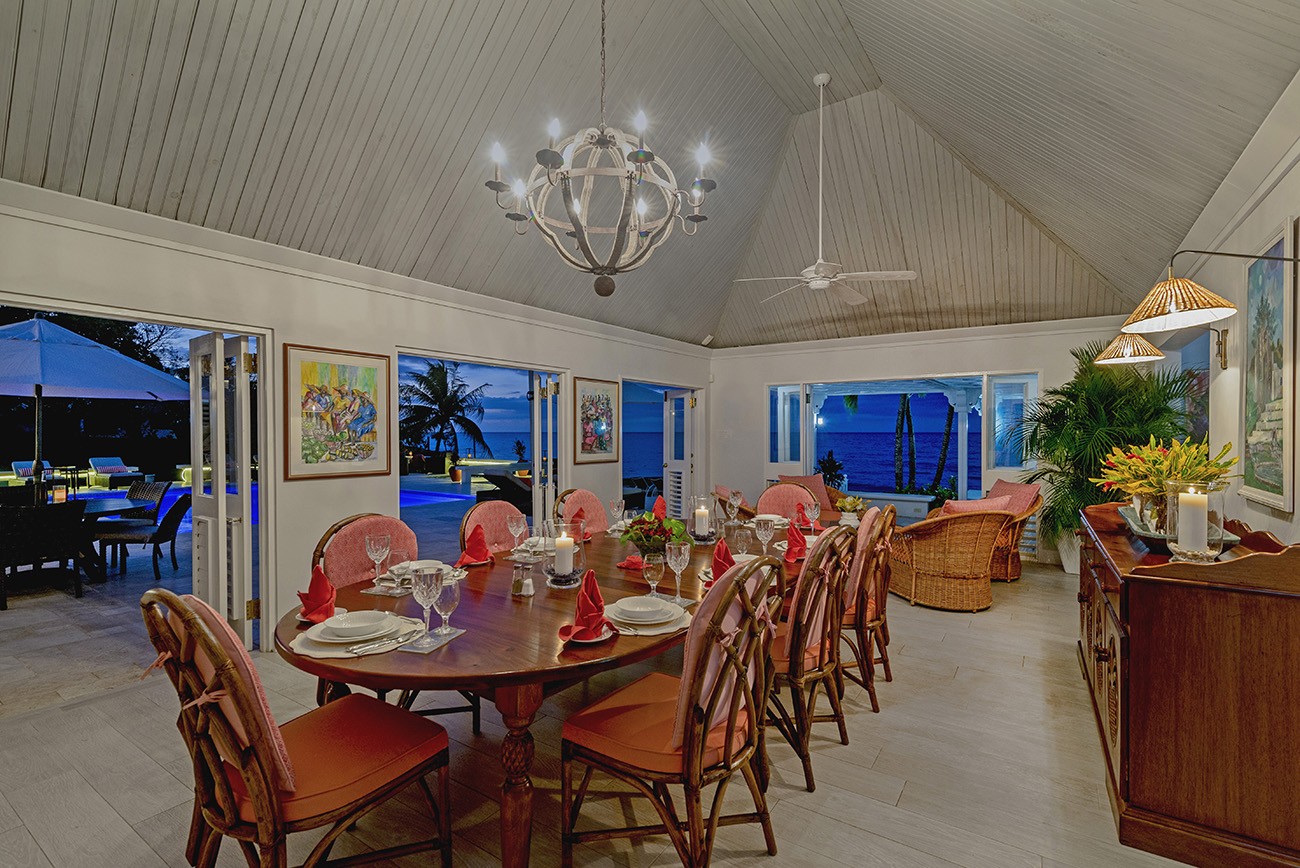 Seaspray villa dining table laid out in the evening